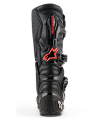 Stivali Alpinestars Tech 7, stivali da motocross, nero e rosso fluo, vista posteriore con piastra protettiva in TPU, logo Alpinestars rosso sul polpaccio, costruzione resistente per prestazioni off-road