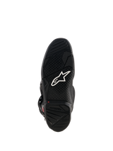 Stivali Alpinestars Tech 7, vista della suola in gomma nera con logo Astar bianco, battistrada strutturato e indicatore di limite di usura rosso per prestazioni motocross