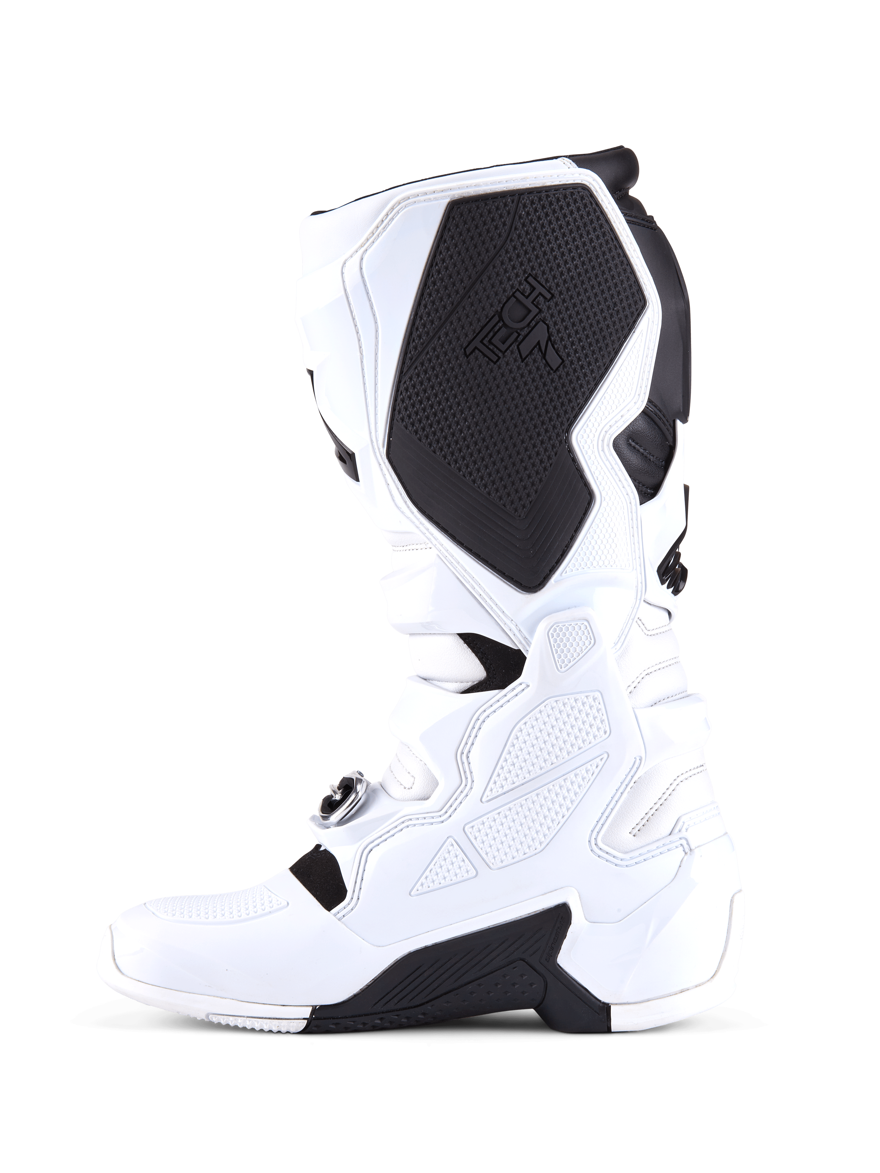 Stivali Alpinestars Tech 7, stivali da motocross, bianco e nero, profilo del lato mediale con un grande pannello protettivo interno nero sul polpaccio con marchio Tech 7, costruzione in TPU bianco e superfici con grip testurizzato.