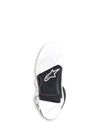 Stivali Alpinestars Tech 7, stivali da motocross, bianco e nero, vista della suola sostituibile in gomma vulcanizzata a doppio composto con inserto centrale nero, logo Alpinestars e indicatore rosso del limite di usura.