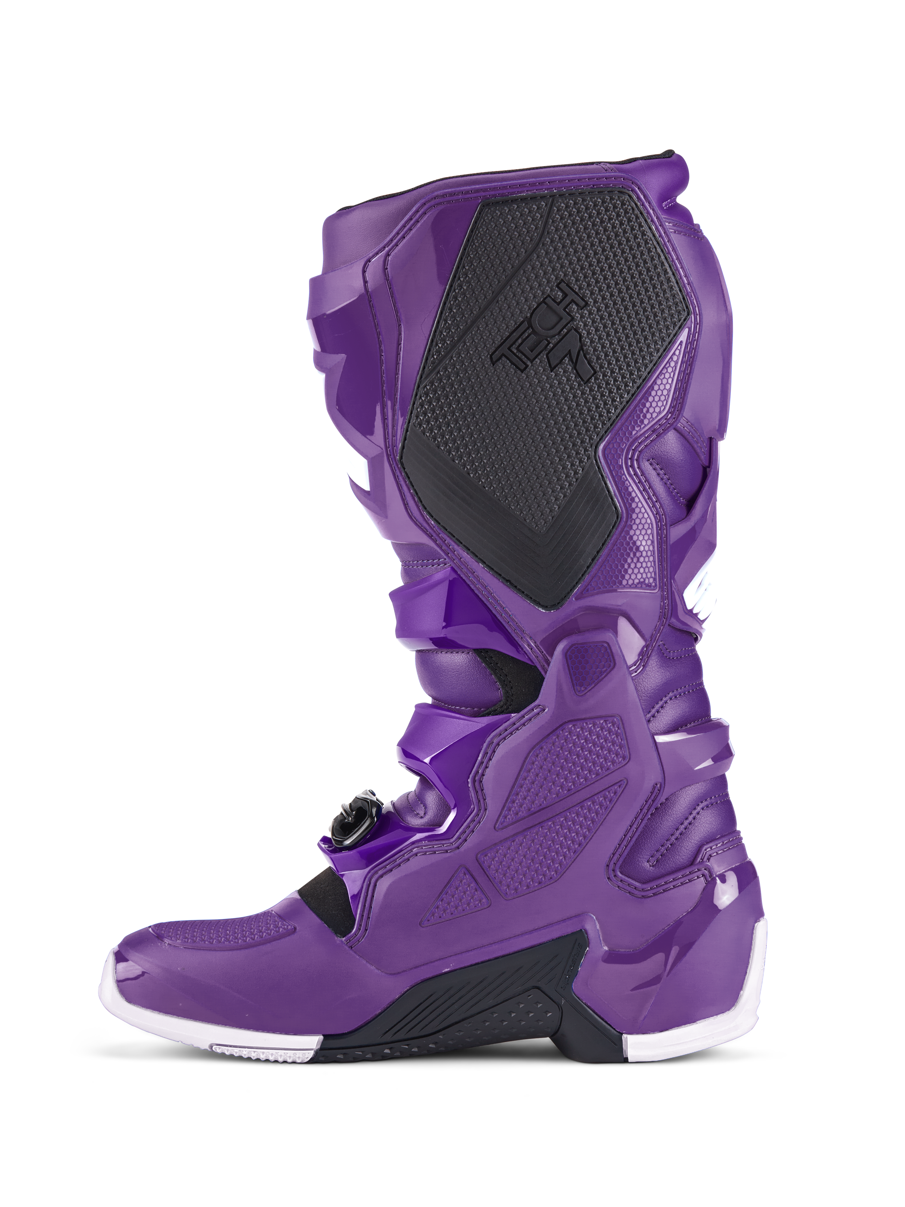 Alpinestars Tech 7 Boots, stivali da motocross viola, vista laterale con protezione del polpaccio nera testurizzata e marchio TECH 7, calotta in TPU viola, sistema di fibbie sicuro e accenti bianchi sulla suola, calzatura specializzata per corse fuoristrada