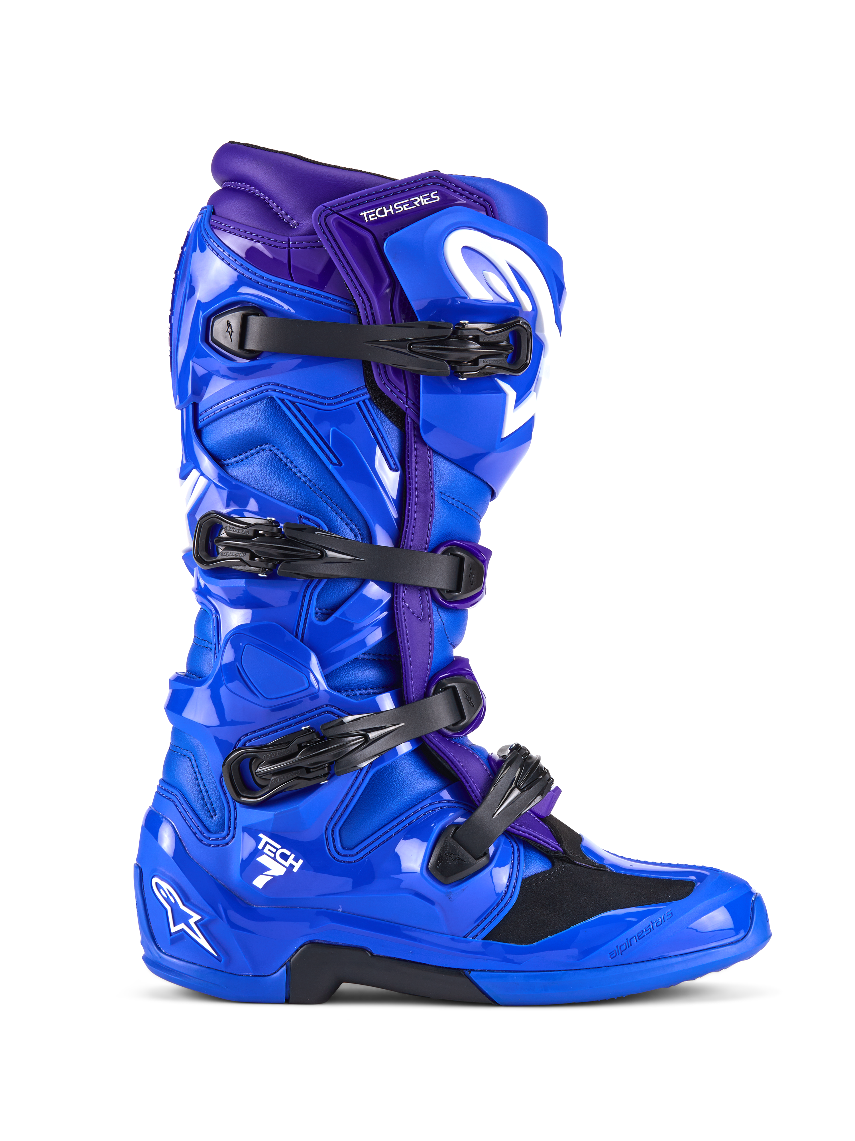 Alpinestars Tech 7, stivali da motocross, blu e viola con quattro fibbie nere, calotta protettiva in TPU lucido con logo Alpinestars bianco, calzatura robusta per corse fuoristrada
