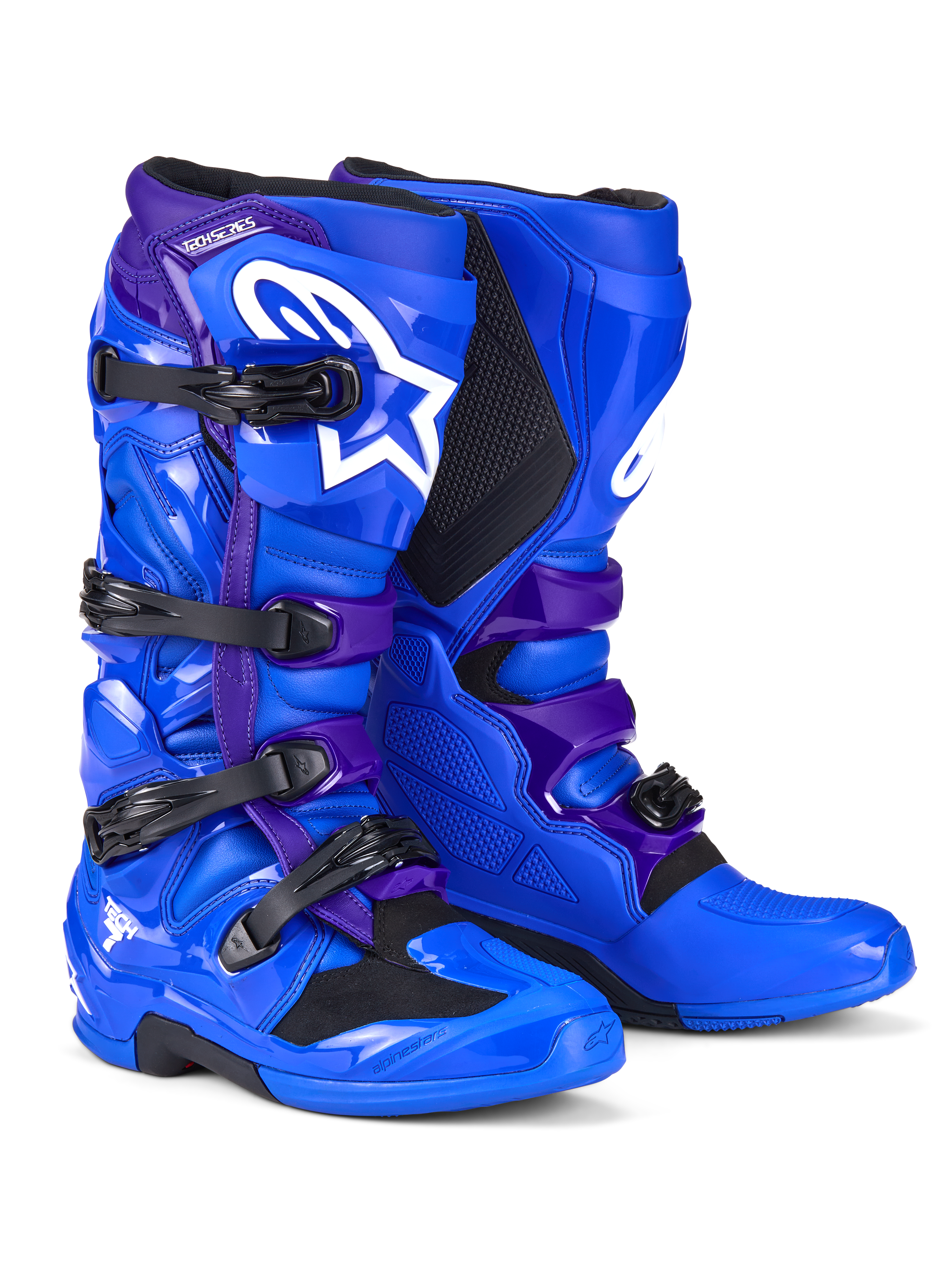 Stivali Alpinestars Tech 7, stivali da motocross, blu e viola, con loghi Alpinestars bianchi, pannelli protettivi in TPU, sistema di chiusura a quattro fibbie e suola robusta per fuoristrada
