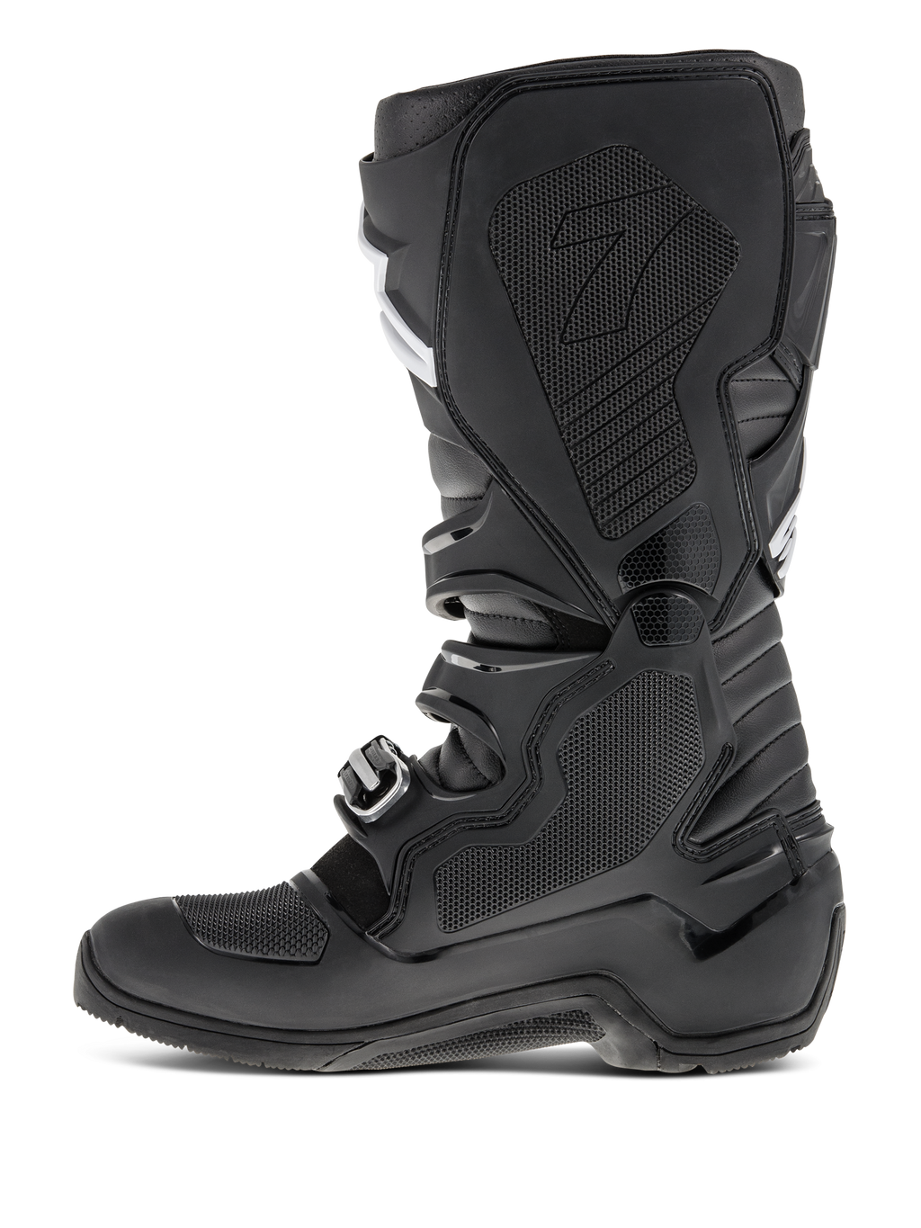Stivali Alpinestars Tech 7 Enduro, nero, vista del profilo laterale con focus sul lato mediale, inserto in gomma a nido d'ape, pannelli protettivi in TPU e sistema di chiusura con fibbie per prestazioni motocross off-road