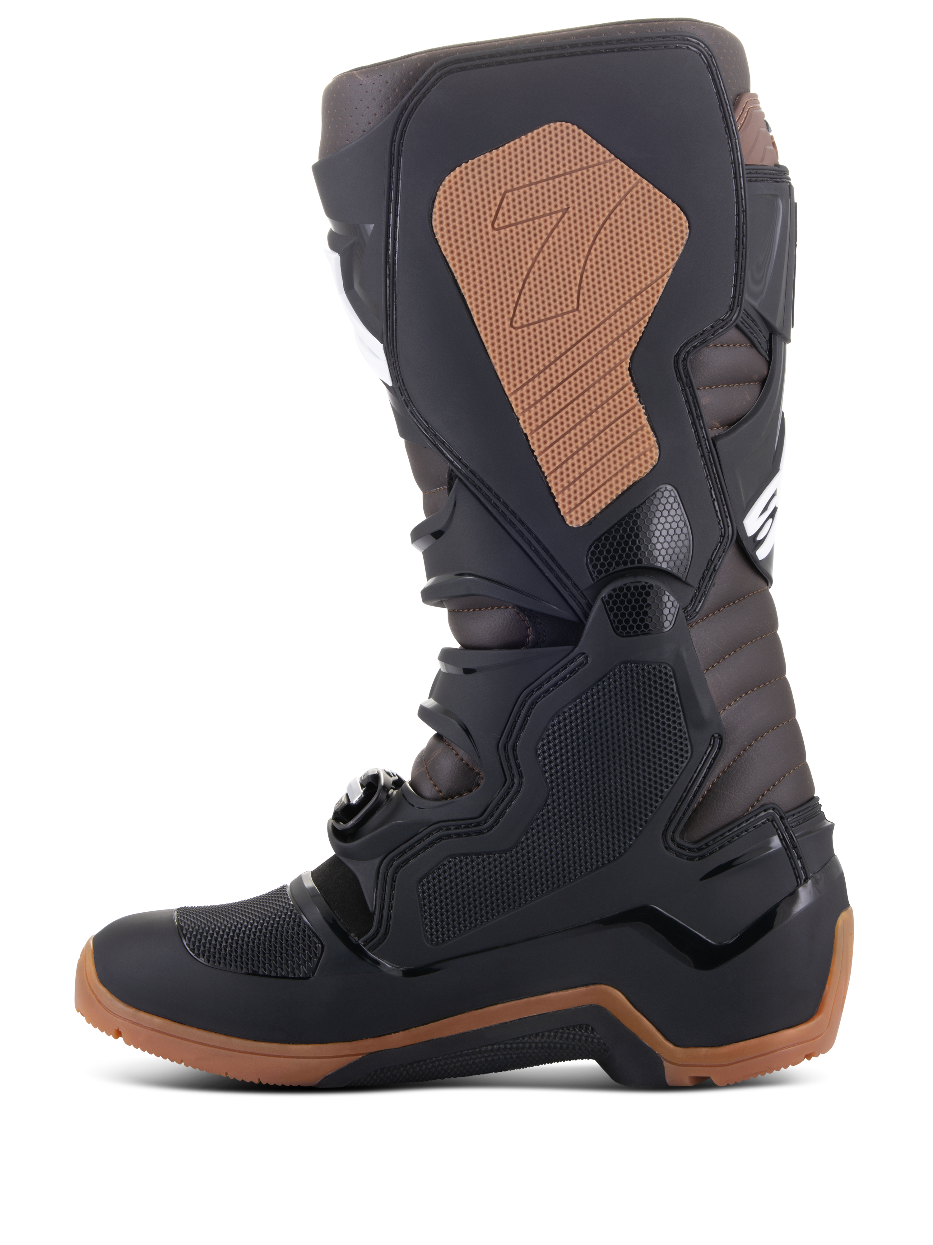 Stivali Alpinestars Tech 7 Enduro, stivali da motocross e fuoristrada, nero e marrone scuro, profilo laterale con placca tibiale in TPU, sistema di chiusura a fibbie, pannello mediale marrone chiaro con logo e suola specifica da enduro per una trazione ottimale.