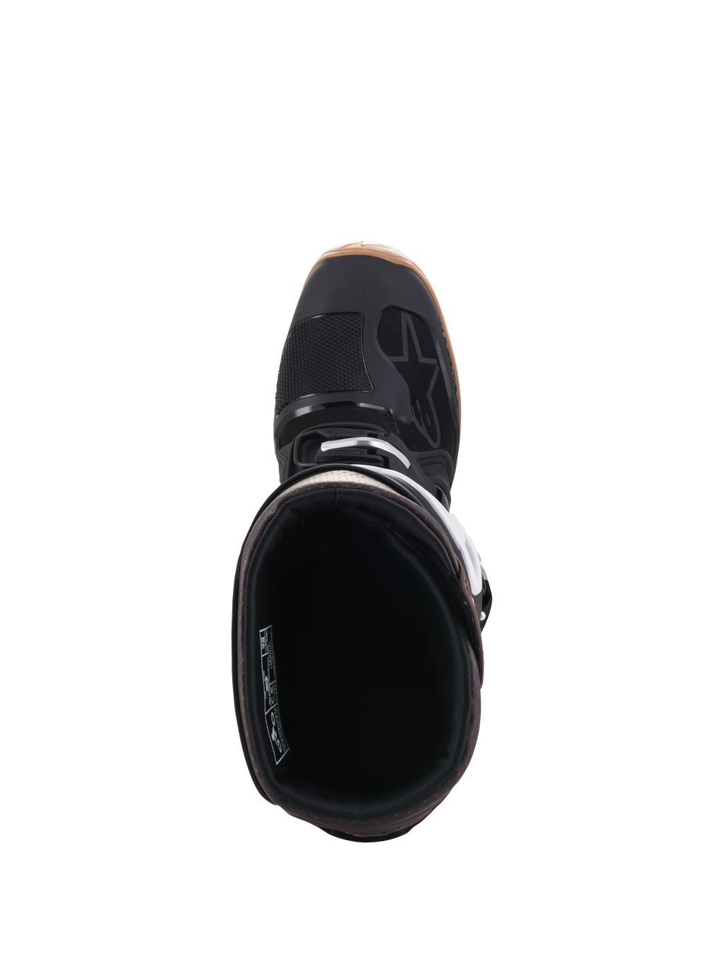 Stivali Alpinestars Tech 7 Enduro, nero e marrone scuro, vista dall'alto che mostra l'apertura dello stivale e la fodera interna, con dettagli delle fibbie bianche e logo Alpinestars, calzatura professionale da motociclismo fuoristrada