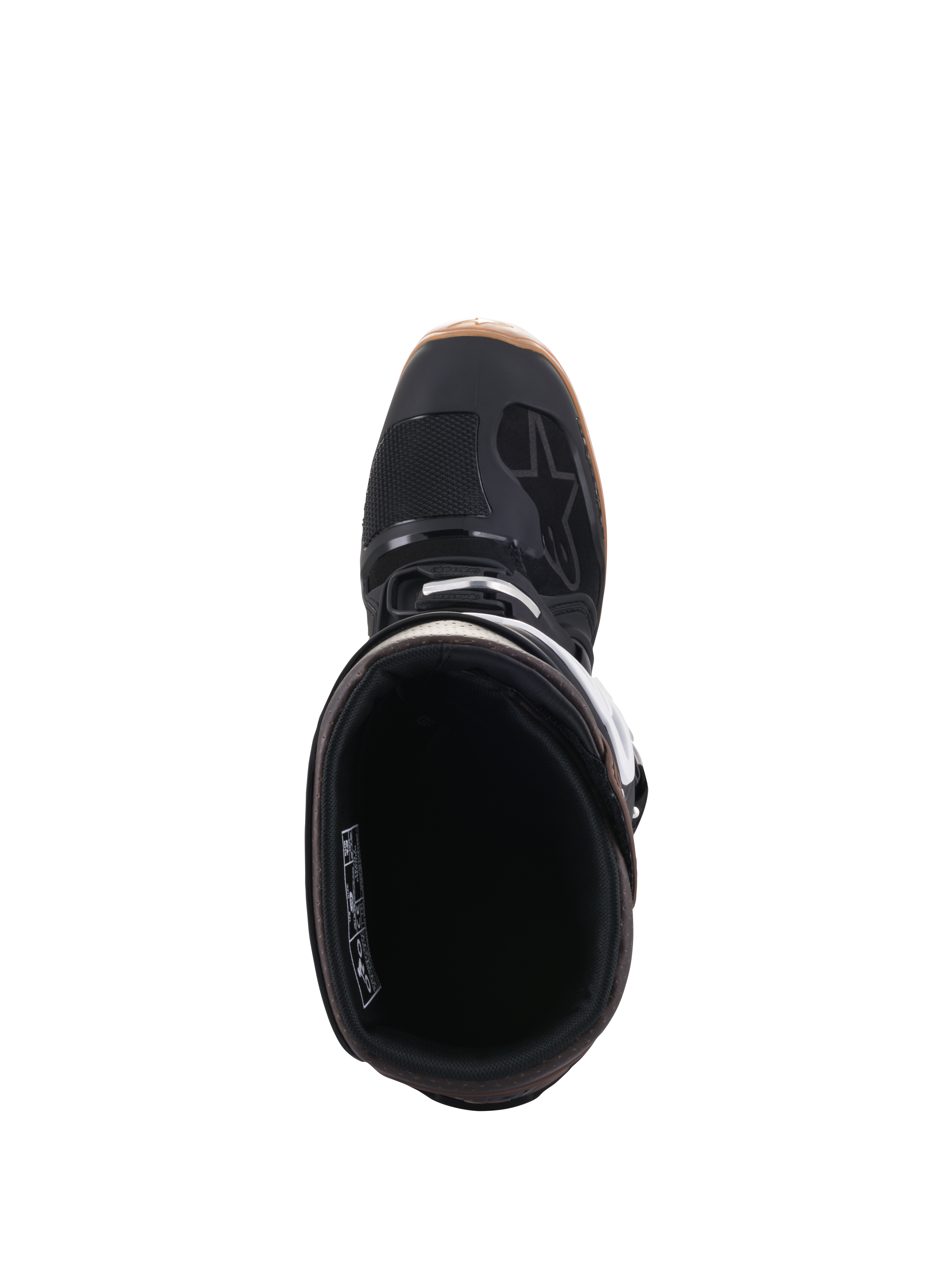 Stivali Alpinestars Tech 7 Enduro, nero e marrone scuro, vista dall'alto che mostra l'apertura dello stivale e la fodera interna, con dettagli delle fibbie bianche e logo Alpinestars, calzatura professionale da motociclismo fuoristrada