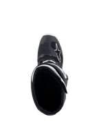Stivali Alpinestars Tech 7 Enduro Drystar®, nero e bianco, vista dall'alto dell'apertura dello stivale, con logo A-star bianco sulla punta, rivestimento interno bianco e design impermeabile ad alte prestazioni per enduro