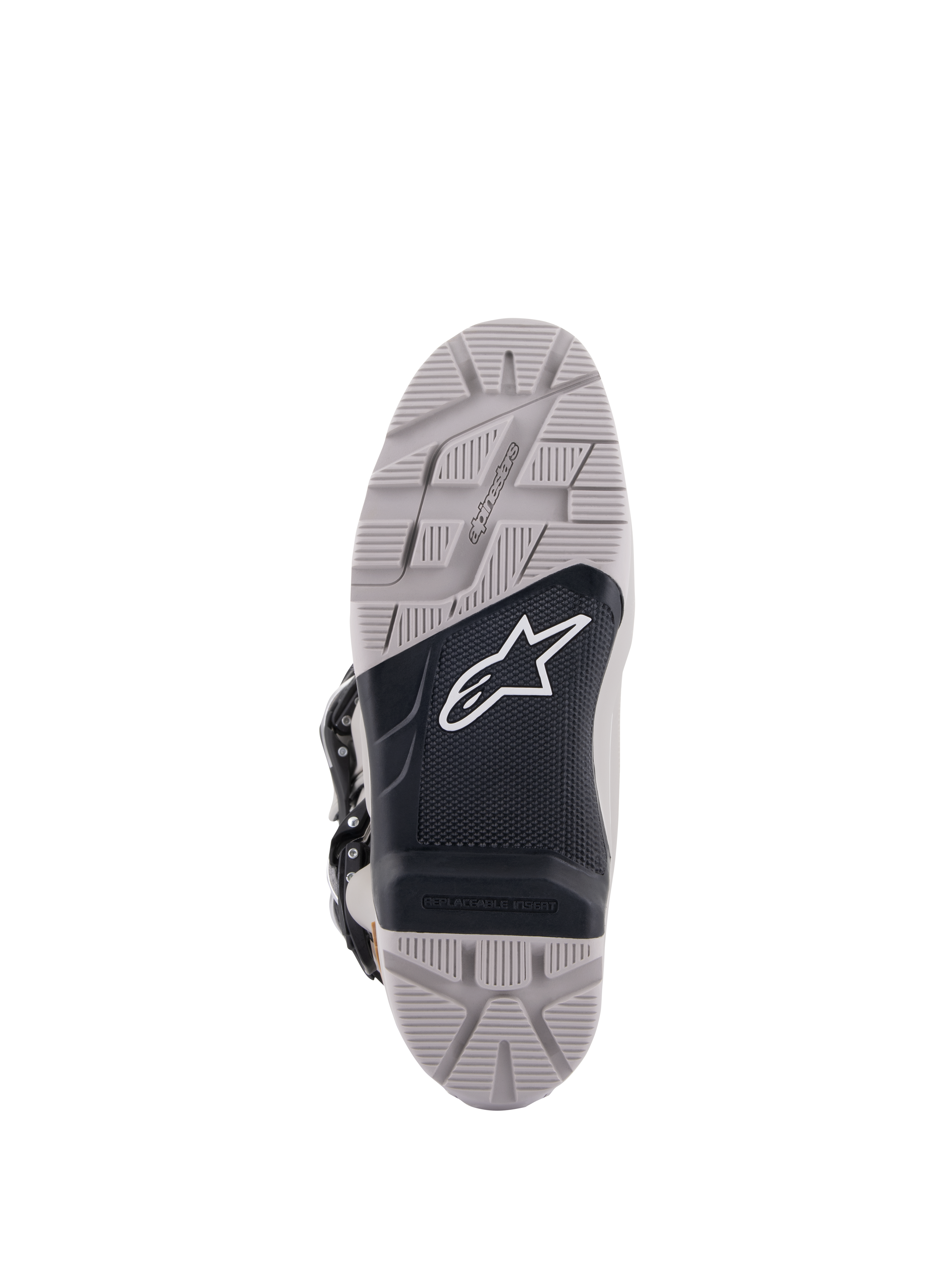 Stivali Alpinestars Tech 7 Enduro Drystar®, vista della suola, grigio e nero, battistrada ad alta aderenza con pannello centrale nero testurizzato, logo Astar bianco, dotato di inserto sostituibile per durata e trazione nella guida enduro
