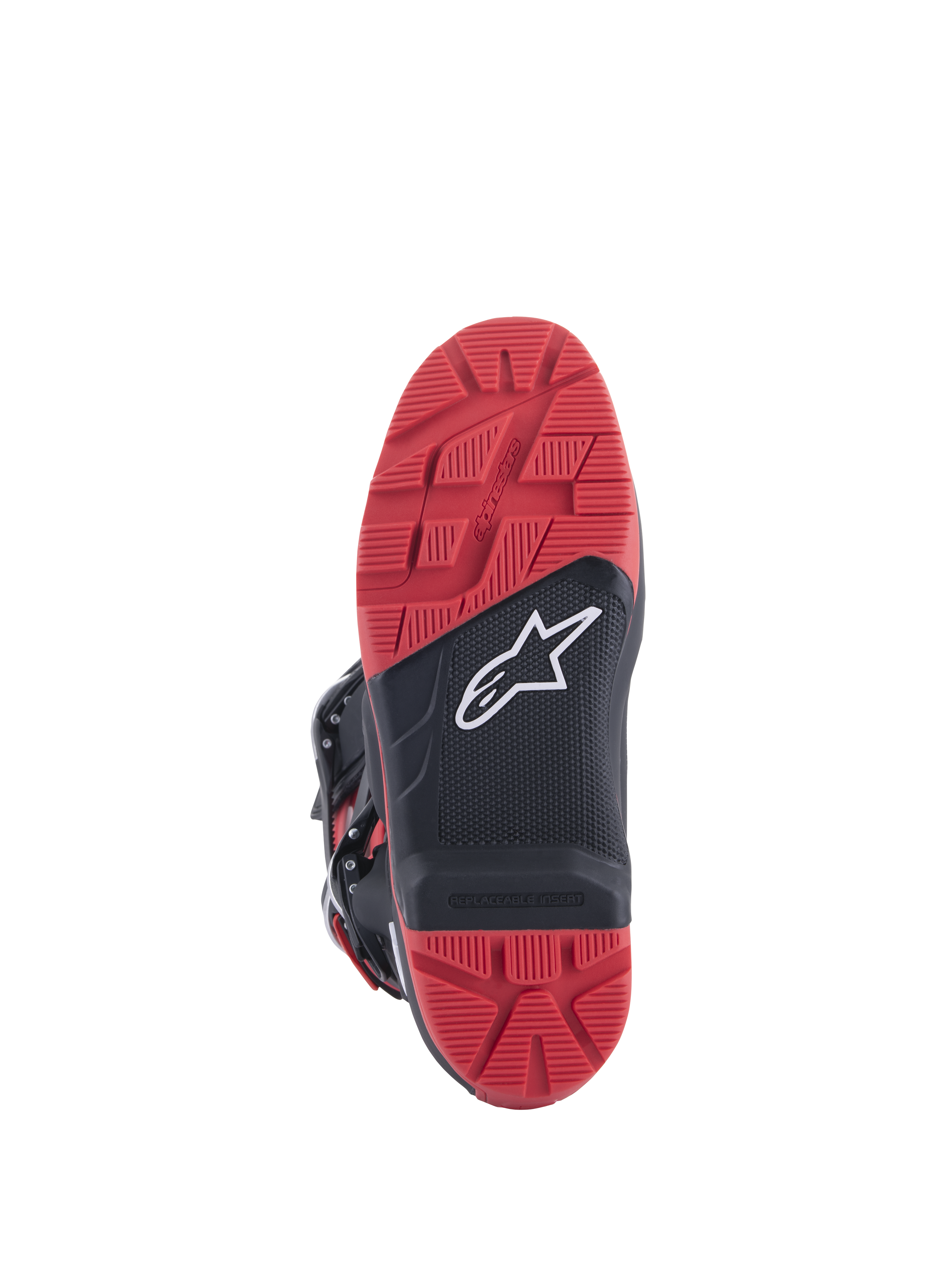 Stivali Honda Tech 7 Enduro Drystar®, nero e rosso brillante, vista della suola con battistrada ad alta aderenza e inserto sostituibile, struttura in gomma a doppia densità, logo Alpinestars bianco su pannello nero testurizzato.