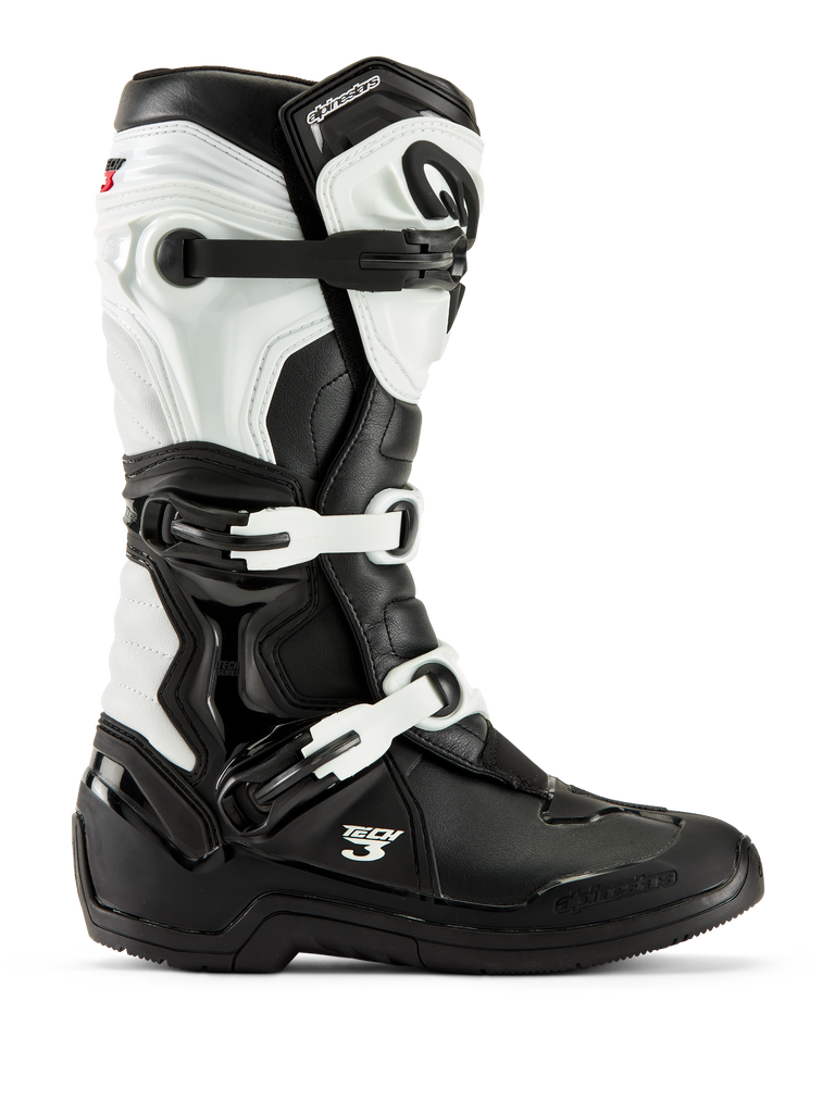 Alpinestars stivali Tech 3, stivali da motocross, nero e bianco, vista laterale di profilo con sistema di chiusura a tre fibbie, pannelli protettivi in TPU e robusta struttura sintetica per gare fuoristrada