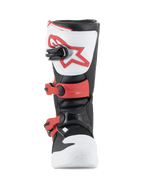 Stivali Alpinestars Youth Tech 3S, stivali da motocross, bianco, nero e rosso acceso, vista frontale con piastra parastinchi in TPU e logo rosso, fibbie rosse regolabili e struttura in microfibra resistente per giovani piloti