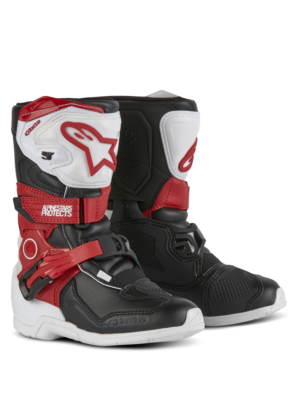 Stivali Alpinestars Kids Tech 3S, stivali da motocross, bianco, nero e rosso acceso, con piastre parastinchi in TPU, cinturini rossi con logo Alpinestars, chiusura a fibbia e suole bianche resistenti.