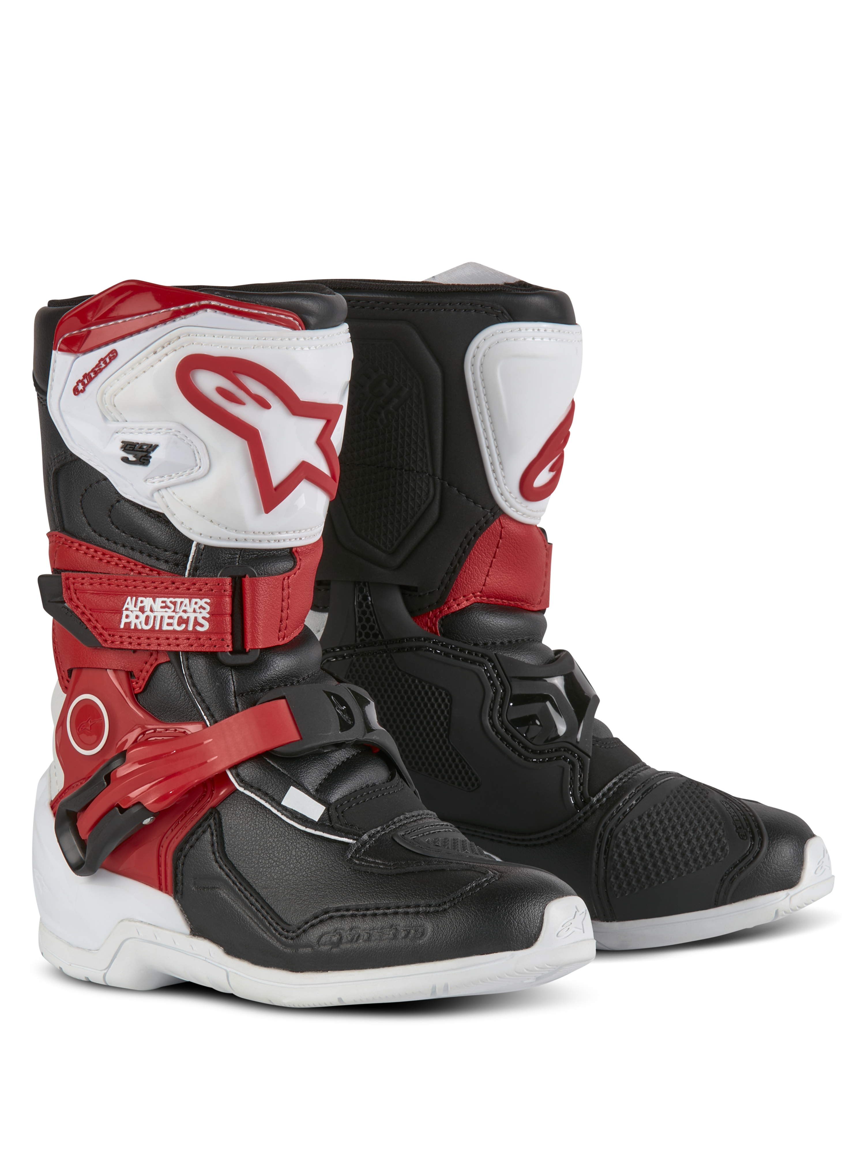 Stivali Alpinestars Kids Tech 3S, stivali da motocross, bianco, nero e rosso acceso, con piastre parastinchi in TPU, cinturini rossi con logo Alpinestars, chiusura a fibbia e suole bianche resistenti.