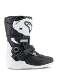 Stivali Alpinestars Kids Tech 3S, stivali da motocross per ragazzi, bianco e nero, vista laterale con design alto, sistema di chiusura con fibbie e cinturini, placca tibiale protettiva in TPU e suola bianca, calzature da moto off-road per bambini