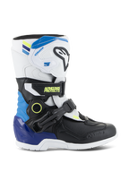 Alpinestars stivali Kids Tech 3S, stivali da motocross per bambini, bianco e nero con dettagli blu e giallo, vista laterale con cinturini a fibbia protettivi e suola robusta, calzature da corsa fuoristrada