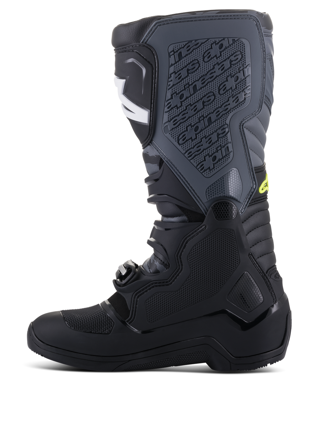 Stivali Alpinestars Tech 5, stivali da motocross, nero e grigio freddo con accenti giallo fluo, profilo laterale che mostra la struttura alta multi-pannello, sistema di chiusura con fibbie e piastra tibiale testurizzata con logo in rilievo, calzature da gara off-road
