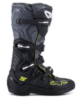Stivali Alpinestars Tech 5, stivali da motocross e fuoristrada, vista laterale, nero e grigio freddo con accenti giallo fluo, motivo camouflage, fibbie regolabili e suola protettiva robusta