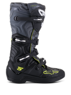 Stivali Alpinestars Tech 5, stivali da motocross e fuoristrada, vista laterale, nero e grigio freddo con accenti giallo fluo, motivo camouflage, fibbie regolabili e suola protettiva robusta
