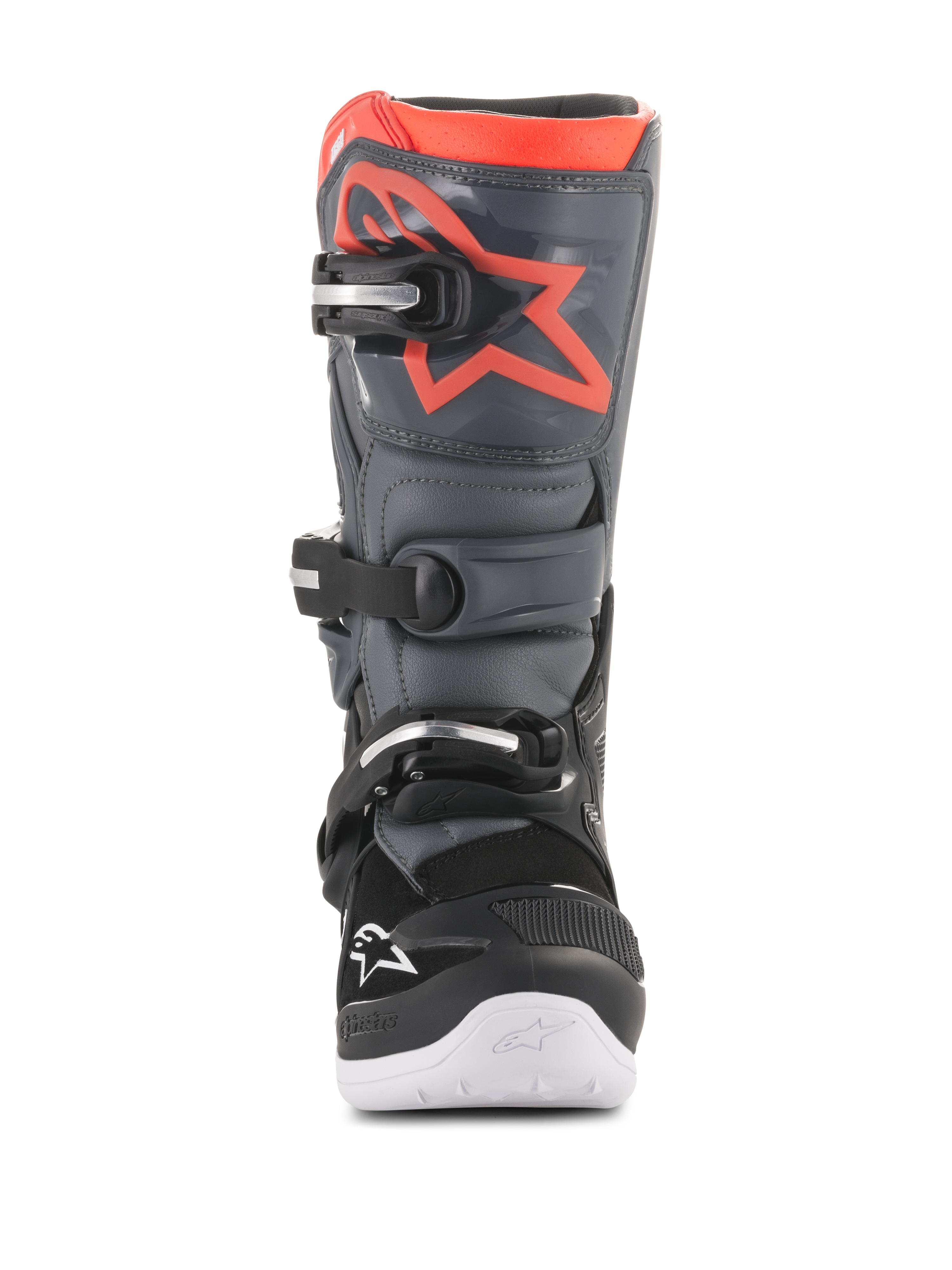 Stivali Alpinestars Youth Tech 7S, stivali da motocross, nero e grigio scuro con accenti rosso fluorescente, vista frontale, con placca tibiale in TPU e logo a stella rosso, sistema di chiusura a tre fibbie e suola integrata bianca, equipaggiamento protettivo resistente per fuoristrada