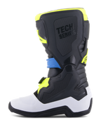 Stivali Alpinestars Youth Tech 7S, stivali da motocross, nero, blu smalto e giallo fluo, caratterizzati da una scocca inferiore bianca, pannelli protettivi neri in TPU con marchio 'TECH SERIES' e un sistema di fibbie sicuro, progettati per giovani piloti.