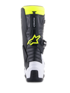Alpinestars Youth Tech 7S Boots, stivali da motocross, nero, bianco e giallo fluo, vista posteriore con protezione tallone bianca e logo Alpinestars giallo neon, calzature da gara off-road resistenti per giovani piloti