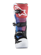 Stivali Alpinestars Youth Tech 7S, stivali da motocross, White Black Rainbow, vista frontale con placca tibiale rossa e logo a stella bianco, pannelli blu e viola, sistema di chiusura a fibbie nere e punta bianca, calzatura da fuoristrada resistente
