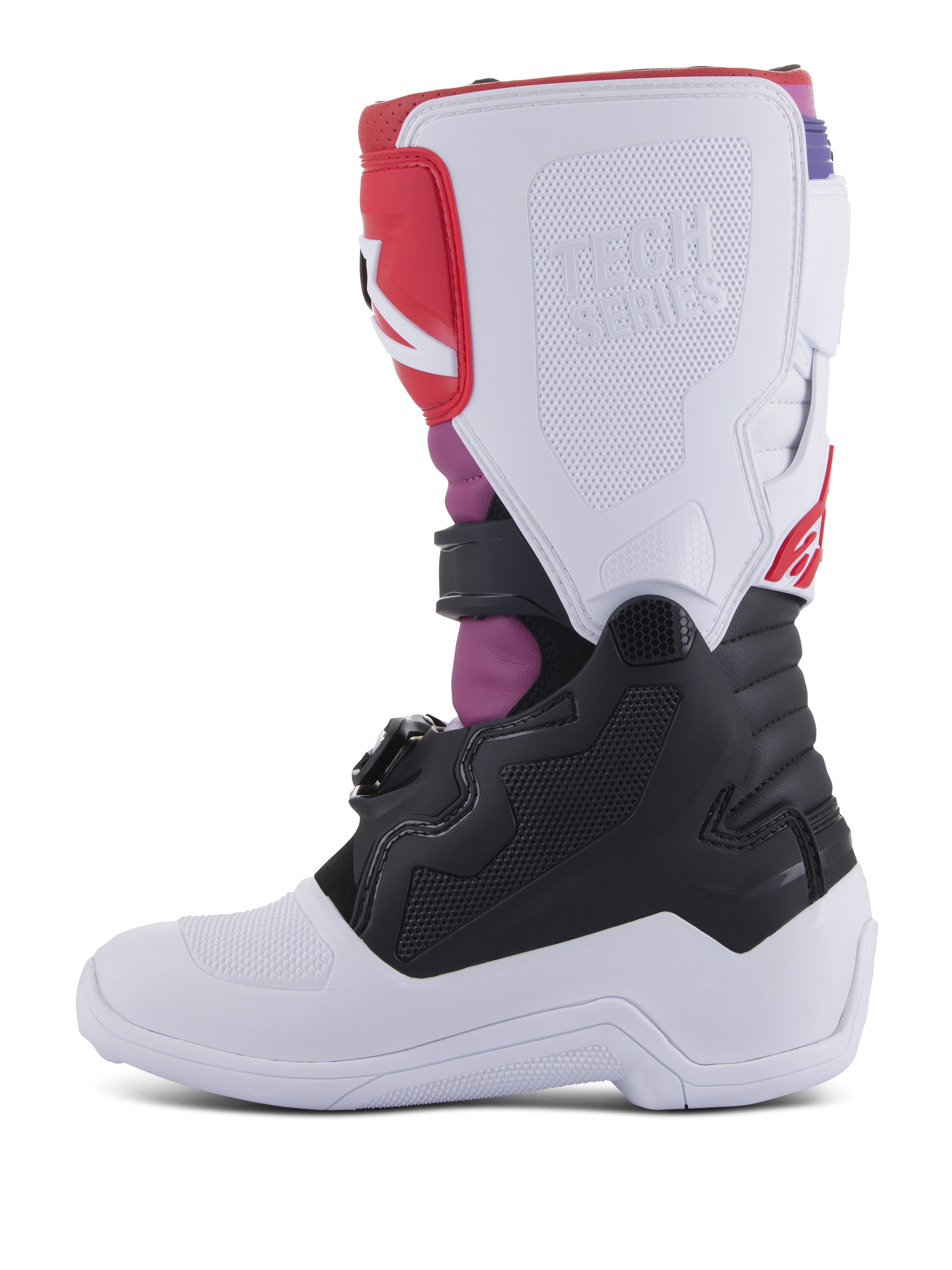 Stivali Alpinestars Youth Tech 7S, stivali da motocross, colore Bianco Nero Rainbow, vista laterale mediale con placca tibiale bianca e logo Tech Series a rilievo, sezione inferiore nera e vivaci accenti rosa e rossi, equipaggiamento protettivo resistente per la guida fuoristrada dei ragazzi