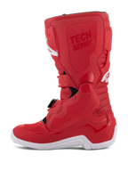 Stivali Alpinestars Youth Tech 7S, stivali da motocross per ragazzi, rosso con suola bianca, pannelli rinforzati in TPU, chiusure a fibbia multiple e marchio 'TECH SERIES', progettati per giovani piloti fuoristrada