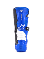 Stivali Alpinestars Youth Tech 7 S, stivali da motocross, blu, nero e bianco, vista posteriore con logo Alpinestars bianco, scocca in TPU blu con zone di flessione a fisarmonica bianche, calzatura protettiva per guida fuoristrada per ragazzi.