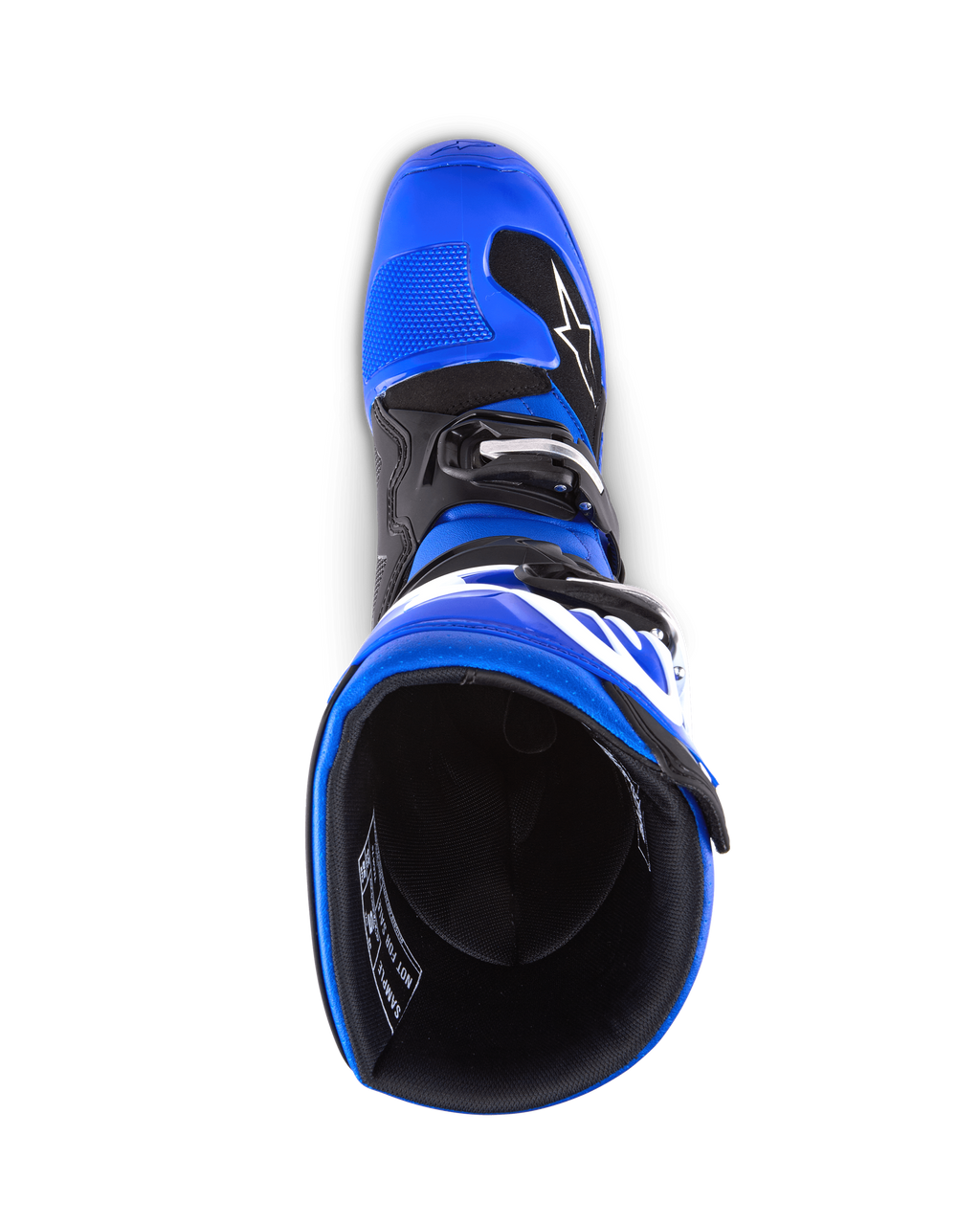 Stivali Alpinestars Youth Tech 7 S, stivali da motocross, blu nero e bianco, vista dall'alto dell'interno dello stivale, mostra la scocca blu e la fodera nera, struttura resistente con logo bianco per motocross giovanile