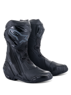 Stivali Alpinestars Supertech R, stivali racing da moto, nero su nero, con placche tibiali protettive in TPU, slider sostituibili e un design aerodinamico per la guida su strada e in pista.