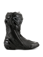 Stivali Alpinestars Supertech R, stivali da moto racing ad alte prestazioni, completamente neri, vista laterale con protezione tibia in TPU, slider sostituibile sulla punta e tallone rinforzato, design professionale da pista