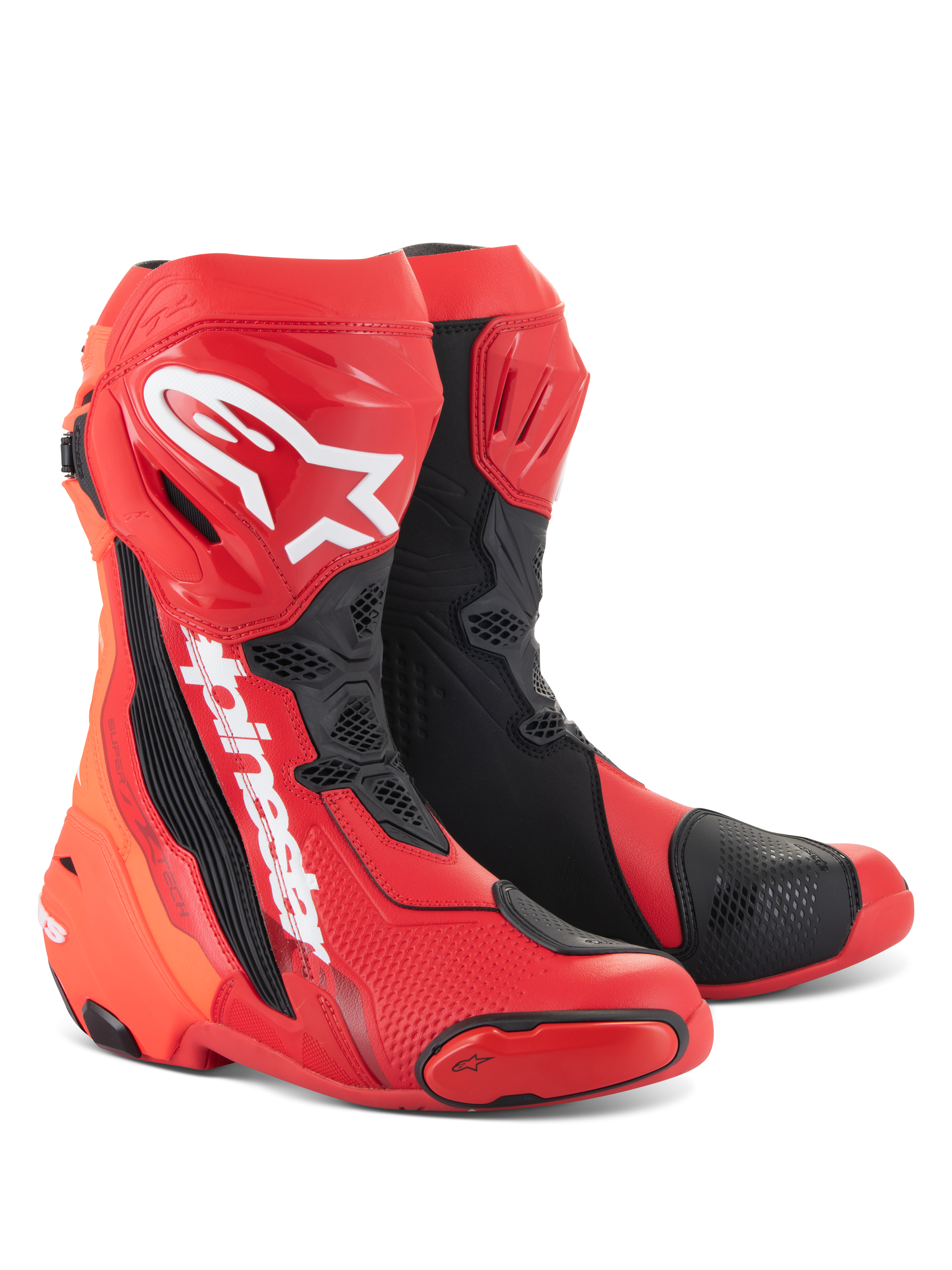 Stivali Alpinestars Supertech R, stivali da moto racing, rosso brillante e rosso fluo con dettagli neri e bianchi, con loghi Alpinestars bianchi sulla tibia, placche protettive rinforzate e slider della punta sostituibili, calzature ad alte prestazioni per sport e racing.