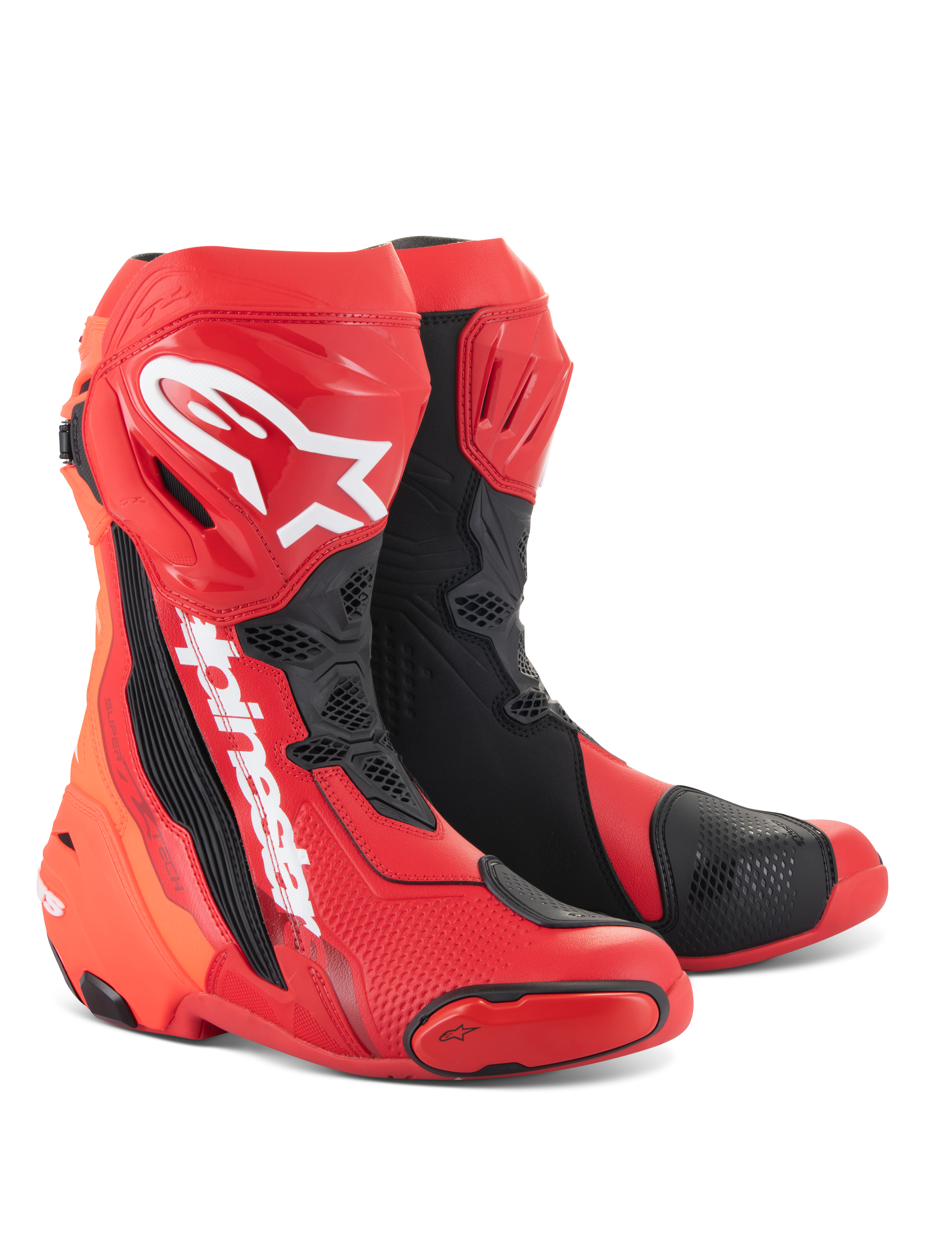 Stivali Alpinestars Supertech R, stivali da moto racing, rosso brillante e rosso fluo con dettagli neri e bianchi, con loghi Alpinestars bianchi sulla tibia, placche protettive rinforzate e slider della punta sostituibili, calzature ad alte prestazioni per sport e racing.