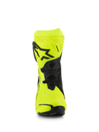 Stivali Alpinestars Supertech R, stivali da moto racing, giallo fluo e nero, vista frontale con logo a stella nero sulla placca tibiale, zone di flessione con trama a nido d'ape e design aerodinamico per corse ad alte prestazioni.