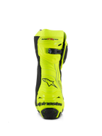 Stivali Alpinestars Supertech R, stivali da moto racing, giallo fluo e nero, vista posteriore con protezione tallone rinforzata, chiusura regolabile sul polpaccio e branding evidente, finitura fluorescente ad alta visibilità per prestazioni su pista e strada