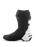 Alpinestars Supertech R Vented Boots, stivali da moto racing, nero e bianco, vista laterale mediale, ampie perforazioni per il flusso d'aria, pannelli in microfibra sintetica bianca, rinforzi in TPU e profilo aerodinamico per le gare in pista