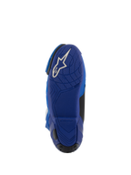 Stivali Alpinestars Supertech R Vented, blu e nero, vista dal basso della suola in gomma blu con logo Astars bianco, con motivi di grip testurizzati per il controllo sulle pedane, calzature da corsa motociclistica ad alte prestazioni.
