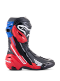 Alpinestars Honda Supertech R Boots, stivali da moto racing, nero, rosso brillante e blu, presentano il marchio Honda bianco sul pannello laterale rosso, logo Alpinestars sulla tibia, ghetta superiore blu, design aerodinamico con protezione avanzata in TPU