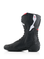 Stivali Alpinestars Honda SMX-6 V3, stivali da moto ad alte prestazioni, nero con accenti rosso brillante e bianco, profilo lato mediale, caratterizzati da una struttura in microfibra resistente, pannelli protettivi in TPU e marchio Honda in rilievo