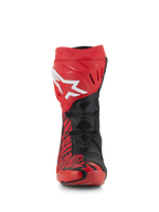 Stivali Alpinestars Supertech R LE Pecco Bagnaia Vented, stivali da corsa rossi e neri, vista frontale, caratterizzati da un grande logo Alpinestars bianco sulla placca tibiale rossa, zone in mesh traforata nera per il massimo flusso d'aria e audaci motivi grafici rossi e neri.