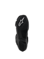 Stivali Alpinestars SMX-6 V3, nero, vista inferiore della suola in gomma leggera, con motivo grip testurizzato, logo Astar bianco e marchio Alpinestars in rilievo sul tallone.