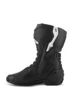 Stivali Alpinestars Stella SMX-6 V3, stivali da moto performanti da donna, nero e bianco, vista laterale mediale con tomaia ergonomica in microfibra, protezioni in TPU per stinco e caviglia, zone in mesh flessibile e design aerodinamico per uso su pista e strada