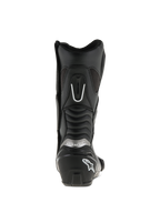 Stivali Alpinestars SMX S, nero, vista posteriore, con contrafforte del tallone rinforzato e logo bianco, marchio argento e pannelli a soffietto per maggiore mobilità e protezione