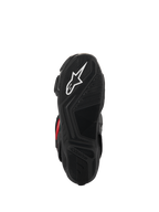 Stivali Alpinestars SMX-6 V3 Drystar®, vista della suola, gomma nera testurizzata per il grip, con logo a stella bianco e marchio Alpinestars in rilievo, calzature da moto ad alte prestazioni.