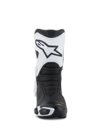 Stivali Alpinestars Stella SMX-6 V3 Drystar®, stivali da moto da donna, bianco e nero, vista frontale che mostra la placca tibiale bianca con il logo Astars, zone di flessione testurizzate nere ed elementi protettivi in TPU per la guida sportiva.