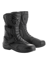 A pair of black Radon Drystar® Boots from Alpinestars EU with a sleek design, featuring reinforced ankles, shin plates, and adjustable straps. The boots boast a combination of smooth and textured leather panels along with a logo emblem on the outer side, providing both style and durable touring protection with 100% waterproofing.