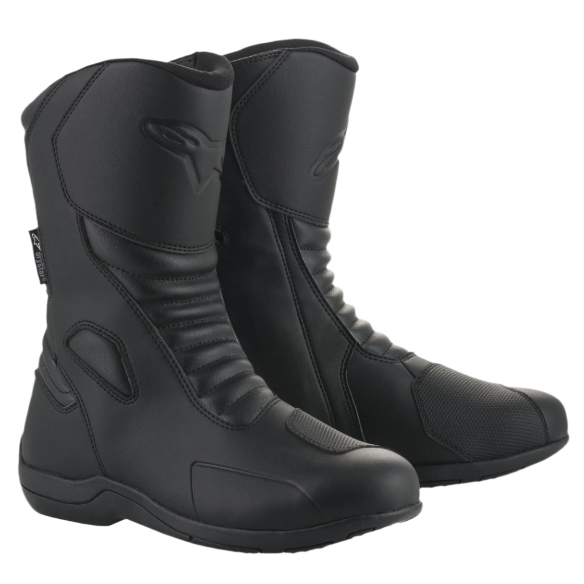 Stivali Alpinestars Origin Drystar®, stivali da touring moto neri, tomaia in microfibra con zone flex a soffietto anteriori, logo Alpinestars in rilievo sul polpaccio, pad sintetico per il cambio, design impermeabile ed elegante per guida su strada e adventure