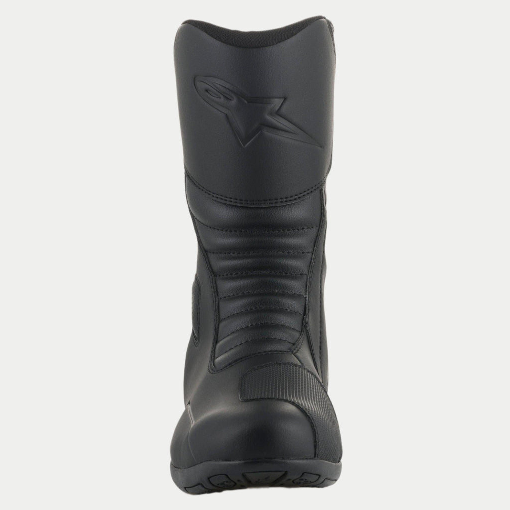 Alpinestars Origin Drystar® Boots, stivali da moto touring neri, vista frontale con zone flessibili a soffietto, logo impresso sullo stinco, costruzione in microfibra resistente e protezione cambio sintetica